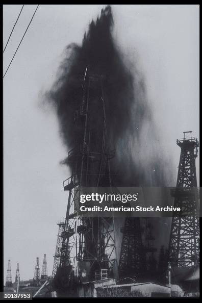 OIL ERUPTS THROUGH RIG IN LONG BEACH, CALIFORNIA