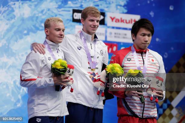 Silver medalist Andrew Seliskar of the United States, Gold medalist Townley Haas of the United States and bronze medalist Katsuhiro Matsumoto of...