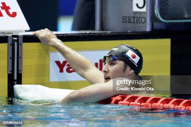 Daiya Seto of Japan reacts after winning the bronze medal in the Men's 400m Individual Medley Final on day one of the Pan Pacific Swimming...