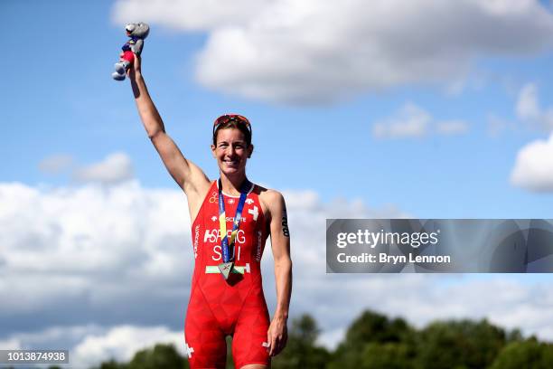 Nicola Spirig of Switzerland celebrates with her Gold medal after winning the women's triathlon on Day eight of the European Championships Glasgow...
