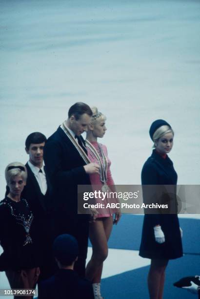 Grenoble, France Oleg Protopopov, Liudmila Belousova in medal ceremony for Pairs skating at the 1968 Winter Olympics / X Olympic Winter Games, Le...