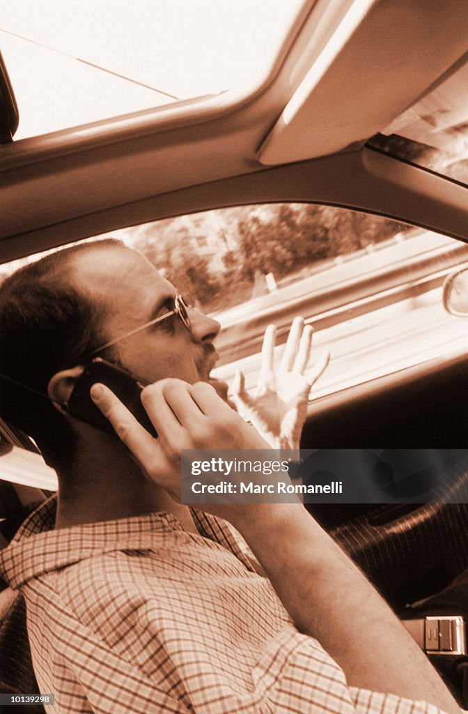 STRESSED MAN DRIVING, RUSH HOUR