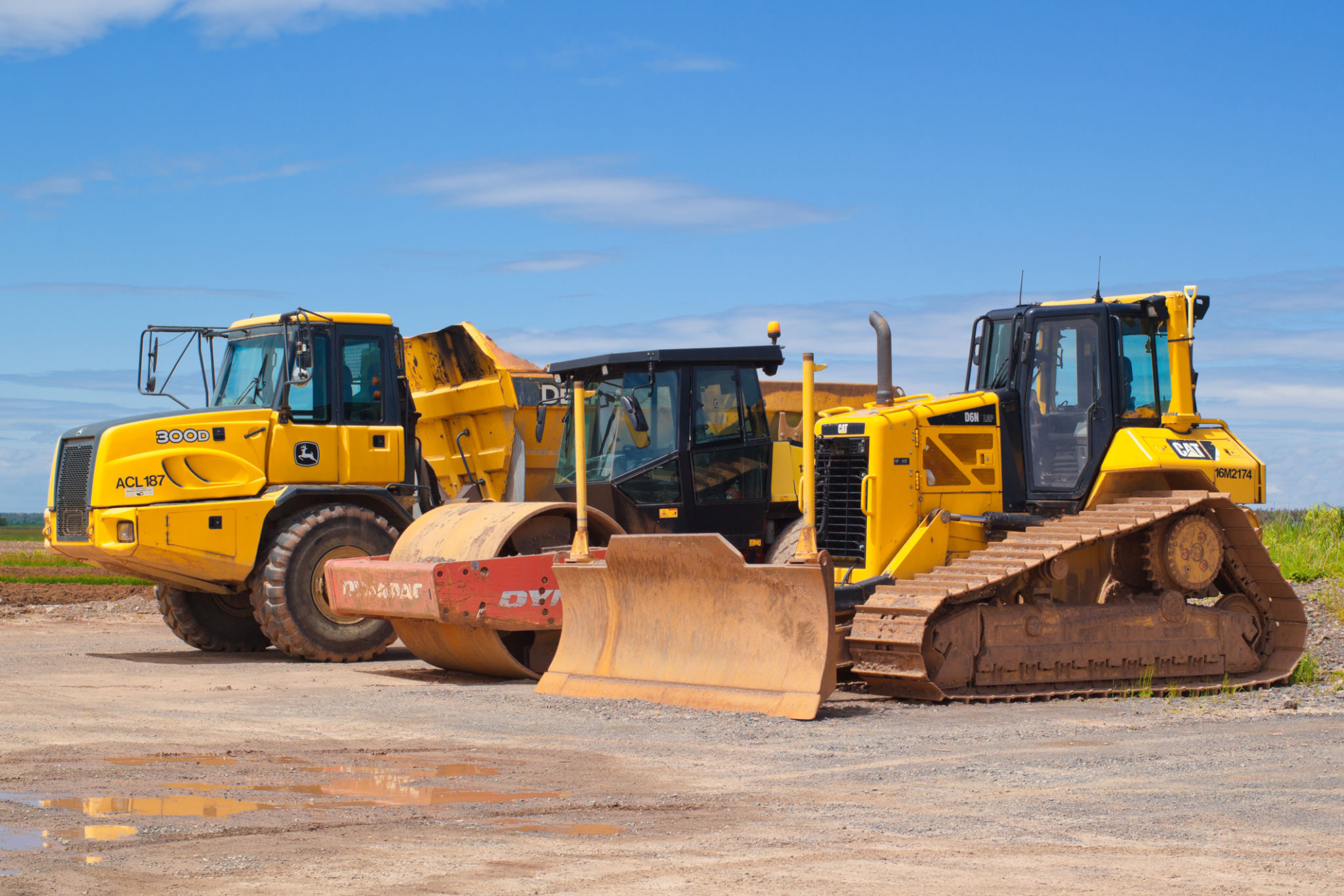 Caterpillar, Dynapac And John Deere heavy equipment. Caterpillar, Dynapac And John Deere heavy equipment.