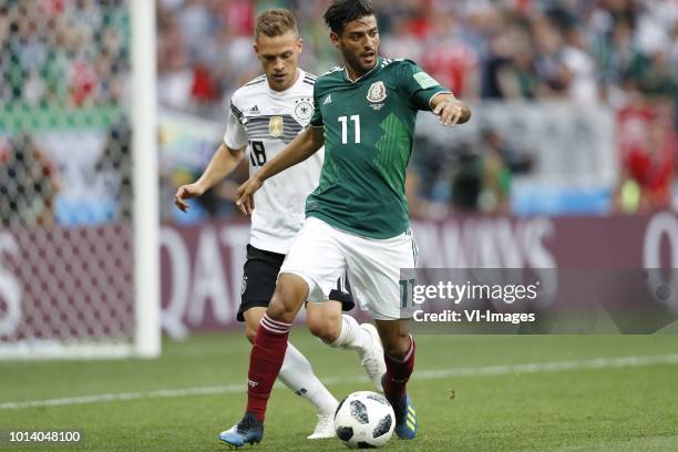 Joshua Kimmich of Germany, Carlos Vela of Mexico during the 2018 FIFA World Cup Russia group F match between Germany and Mexico at the Luzhniki...