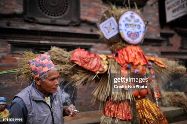 Nepalese devotee arrive to observe Ghantakarna during the Gathemangal festival celebrated at Thimi, Bhaktapur, Nepal on Thursday, August 09, 2018....