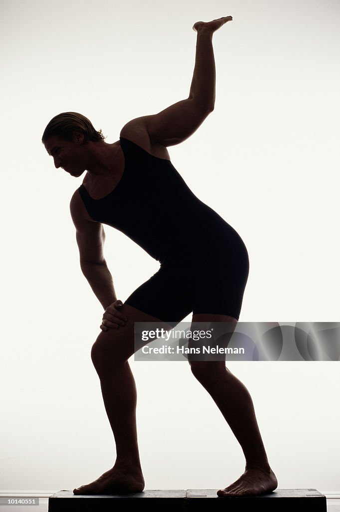 MUSCLE MAN IN POSE, SILHOUETTE