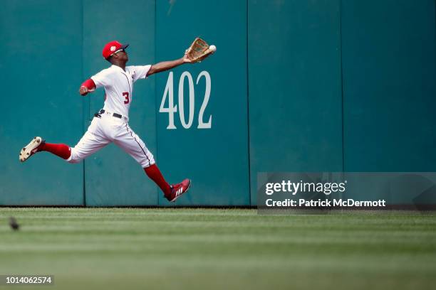 Michael Taylor of the Washington Nationals is unable to catch a double hit by Freddie Freeman of the Atlanta Braves in the eighth inning at Nationals...