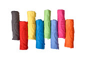 Row of colorful rolled clothes