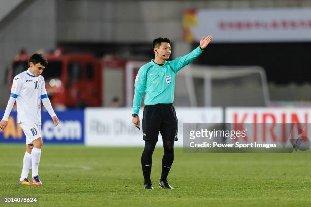 Referee Kim Dong Jin gestures during the AFC U23 Championship China 2018 Group A match between Qatar and Uzbekistan at Changzhou Olympic Sports...