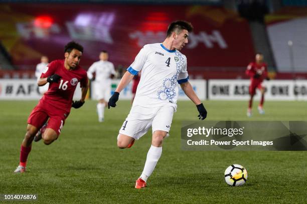 Akramjon Komilov of Uzbekistan in action during the AFC U23 Championship China 2018 Group A match between Qatar and Uzbekistan at Changzhou Olympic...