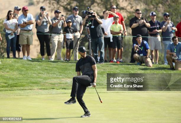 Player Stephen Curry of the Golden State Warriors reacts after putting on the 11th hole during Round One of the Ellie Mae Classic at TBC Stonebrae on...