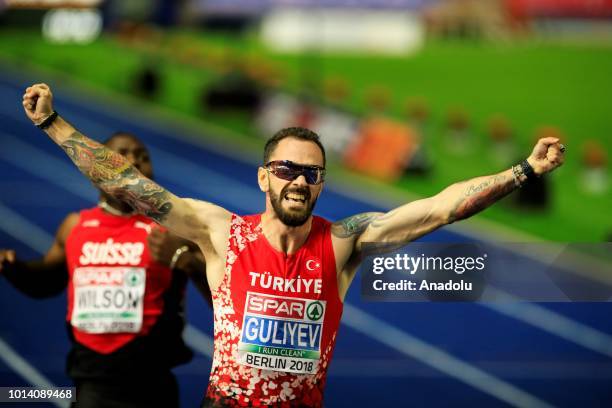 Turkish athlete Ramil Guliyev celebrates after winning the gold medal with 19.76 seconds in 200-meter men's race final during the fourth day of the...