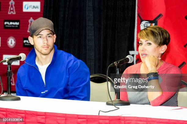 Singer-Songwriter Nick Jonas and Deidre Pujols attend the Strike Out Slavery Press Conference at Angel Stadium on August 9, 2018 in Anaheim,...