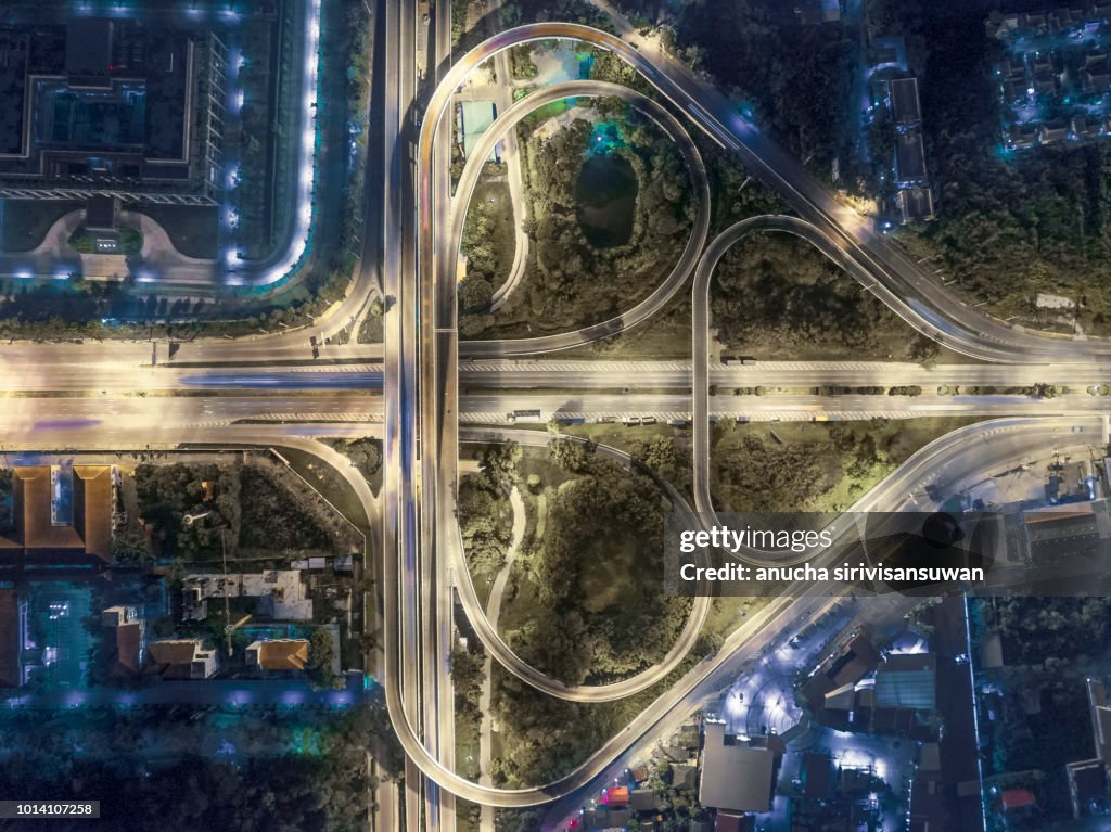Aerial view, Expressway road intersection, traffic in bangkok at night, thailand.