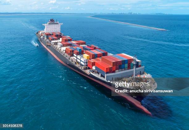 aerial view of cargo ship runing on sea close warehouse harbor at thailand . - ship stock pictures, royalty-free photos & images