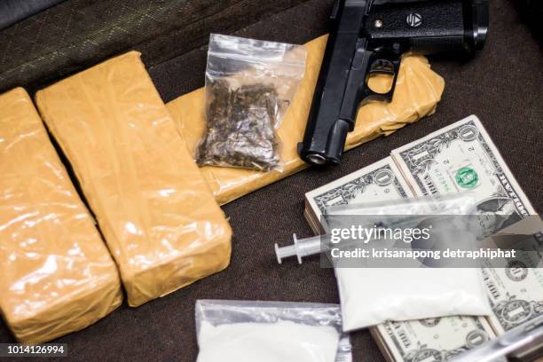 drug trafficker,injection needle,dollar - cocaine stock pictures, royalty-free photos & images