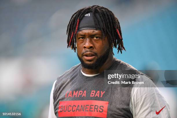 Gerald McCoy of the Tampa Bay Buccaneers warms up before the preseason game against the Miami Dolphins at Hard Rock Stadium on August 9, 2018 in...