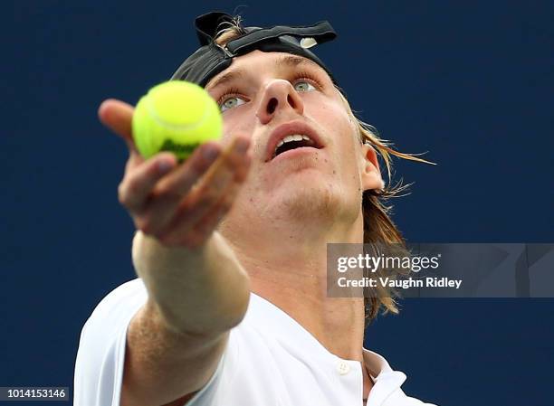 Denis Shapovalov of Canada serves against Robin Haase of The Netherlands during a 3rd round match on Day 4 of the Rogers Cup at Aviva Centre on...