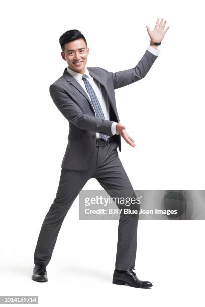 cheerful young businessman - human limb stock pictures, royalty-free photos & images