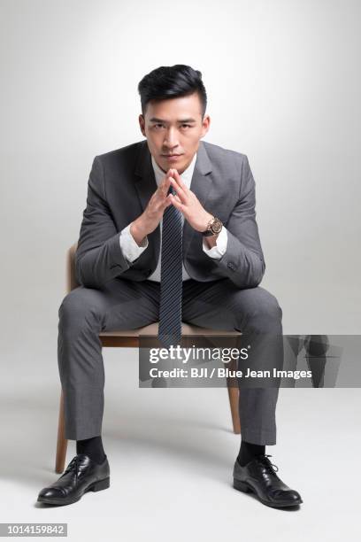 portrait of young businessman - cool boss stock-fotos und bilder
