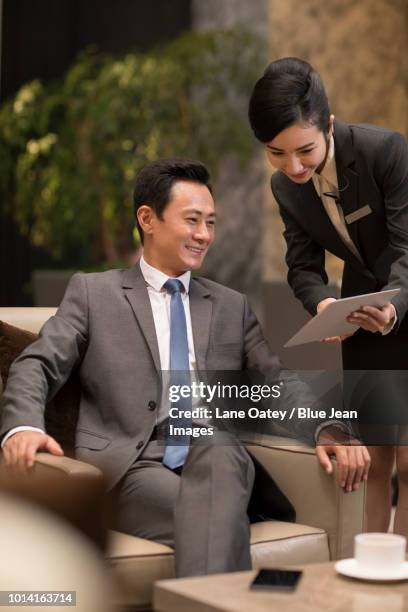 professional service in luxury hotel - vip reception stock pictures, royalty-free photos & images