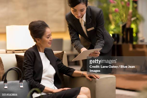 professional service in luxury hotel - first class lounge stock pictures, royalty-free photos & images