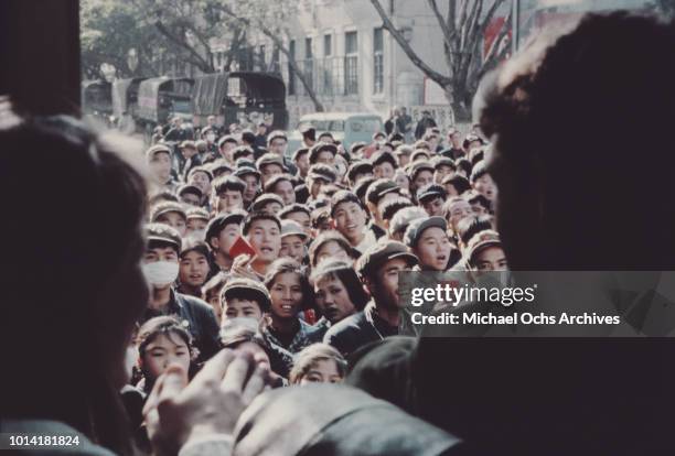 Supporters of communist leader Mao Zedong holding copies of his 'Little Red Book' in China, circa 1966.