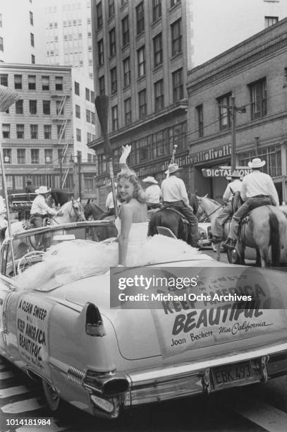 Joan Beckett, Miss California, campaigns for the Young Republicans in San Francisco, California, 22nd August 1956. A sign on the car reads 'A Clean...