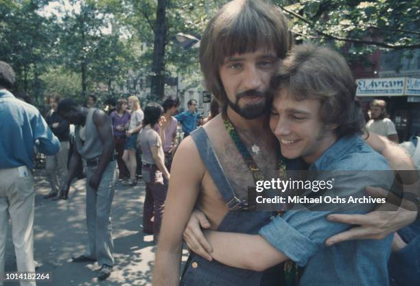 Couple at an LGBT parade through New York City on Christopher Street Gay Liberation Day 1971.