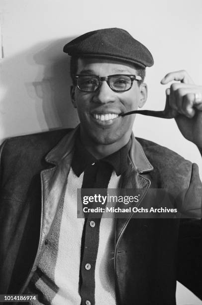 Member of American vocal group The Temptations backstage at the Apollo Theatre in New York City, circa 1965.