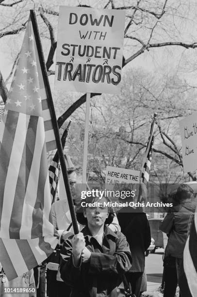 Placard reading 'Down With Student Traitors' at a pro-Vietnam War rally in Washington, DC, May 1965.