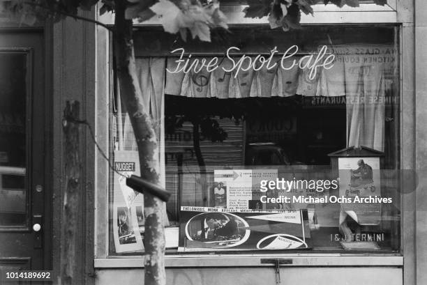 The Five Spot Café, a jazz club at 5 Cooper Square in the Bowery neighbourhood of New York City, circa 1957. A sign informs patrons that jazz pianist...