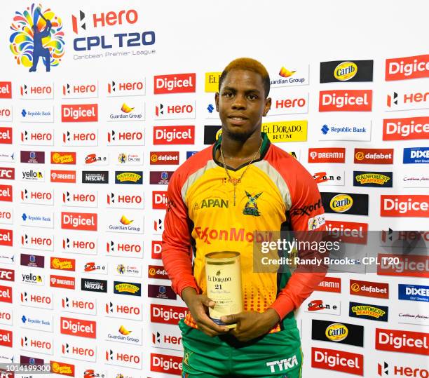 In this handout image provided by CPL T20, Shimron Hetmyer of Guyana Amazon Warriors with the man of the match prize at the end of the Hero Caribbean...