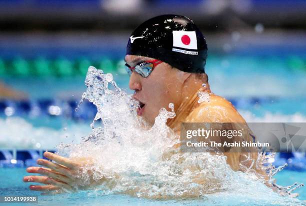 Yasuhiro Koseki of Japan competes in the Men's 100m Breaststroke Final on day one of the Pan Pacific Swimming Championships at Tokyo Tatsumi...