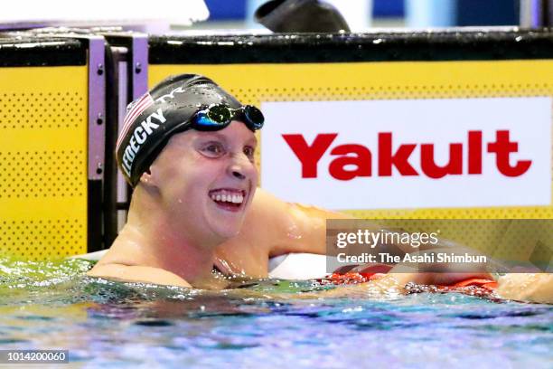 Katie Ledecky of the United States celebrates winning the gold medal after competing in the Women's 800m Timed-Final on day one of the Pan Pacific...