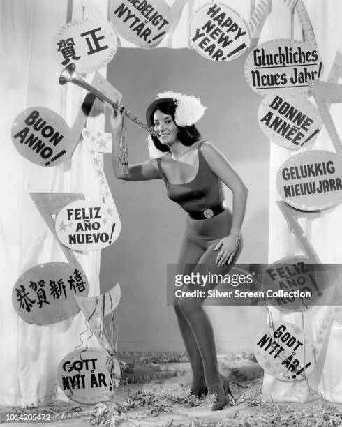 Argentine-American actress Linda Cristal wishes the viewer a 'Happy New Year' in a variety of different languages, circa 1960.