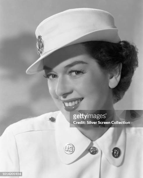 American actress Rosalind Russell joins the Women's Army Corps in the film 'Never Wave at a WAC', 1953.