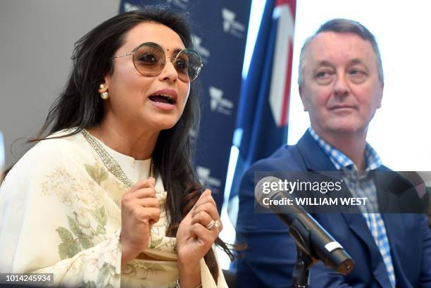 Indian Bollywood actress Rani Mukerji speaks as Victoria's Minister for Creative Industries Martin Foley listens during a press conference on the...