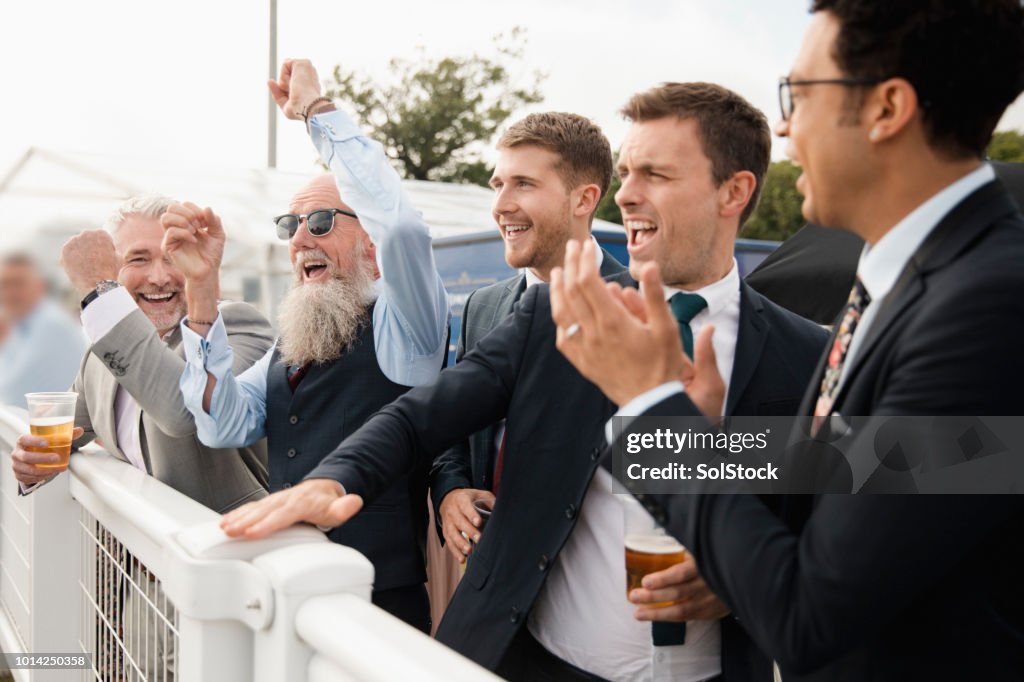 Friends Celebrating At The Races