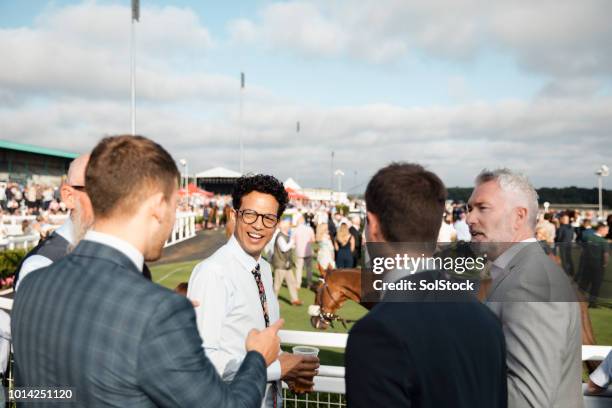 men talking at the races - british upper class stock pictures, royalty-free photos & images