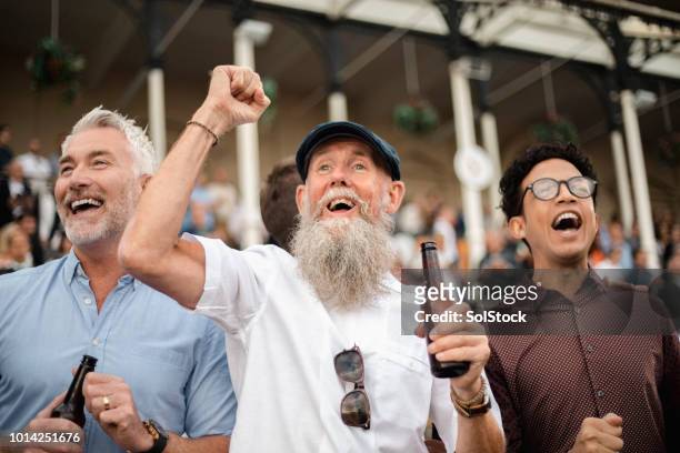 three men celebrating - newcastle races stock pictures, royalty-free photos & images