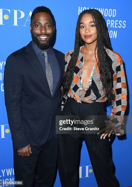 John David Washington, Laura Harrier arrives at the Hollywood Foreign Press Association's Grants Banquet at The Beverly Hilton Hotel on August 9,...