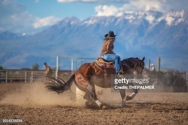 cowgirl barrel racing rodeo - barrel race stock pictures, royalty-free photos & images
