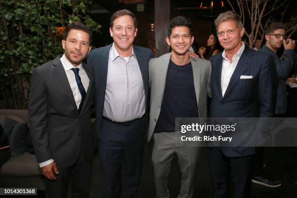 Carlo Alban, Adam Fogelson, Iko Uwais and Bob Simonds attend the after party for the premiere of STX Films' "Mile 22" at Westwood Village Theatre on...