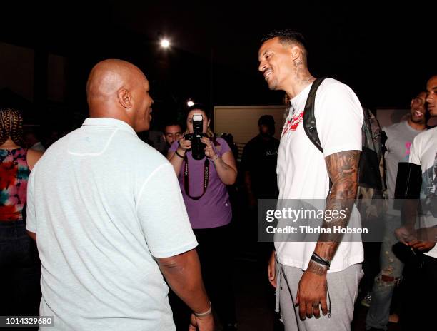 Mike Tyson and Matt Barnes attend the Athletes vs Cancer Smoke4aCure Event on August 9, 2018 in Inglewood, California.