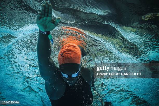 Ugandan swimmer Clare Byarugaba competes during the swimming competition at the 2018 Gay Games edition at The Georges-Vallerey swimming pool in Paris...