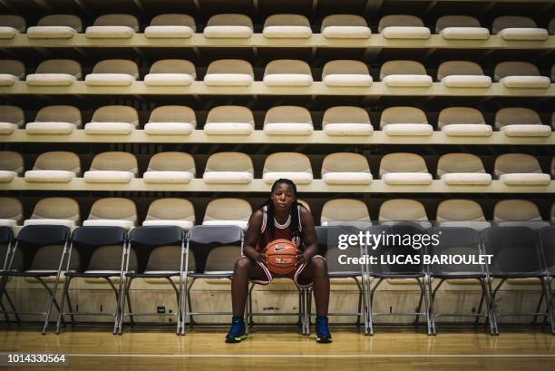 Ugandan transgender player Jay Mulucha poses during a break in the basketball competition at the 2018 Gay Games edition at the Palais des Sports...