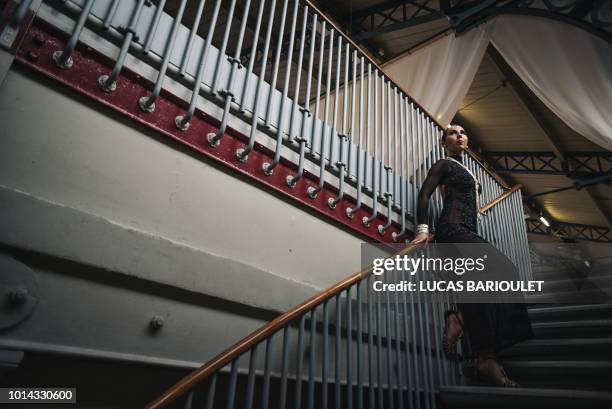 Russian dancer Yulia Zhdanova poses inside the Gymnase Japy in Paris on August 7, 2018 during the dancing contest of the 2018 Gay Games edition. -...