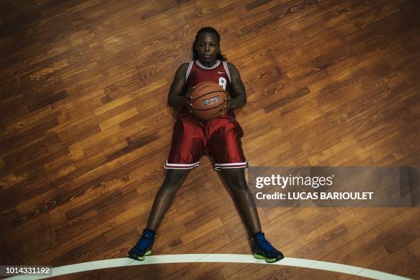 Ugandan transgender player Jay Mulucha poses during a break in the basketball competition at the 2018 Gay Games edition at the Palais des Sports...