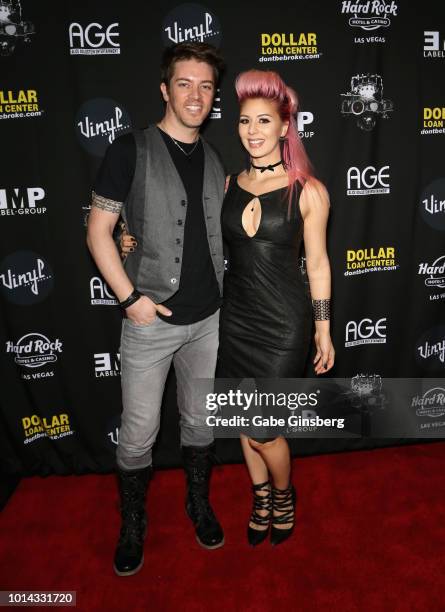 Television personality J.D. Scott and model Annalee Belle attend a CD release party for CO-OP at Vinyl inside the Hard Rock Hotel & Casino on August...